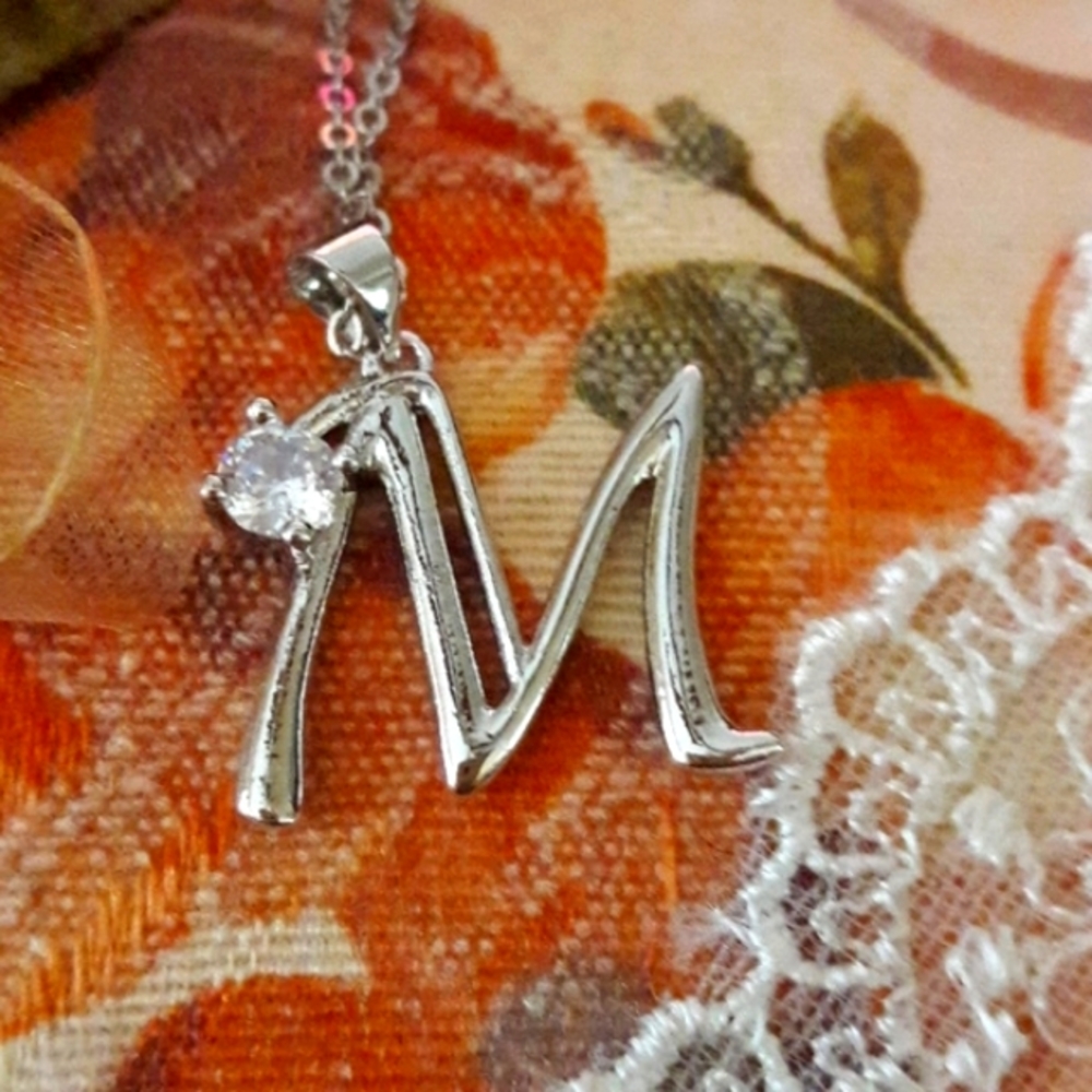 "M" pendant w/Stone & 18" chain.